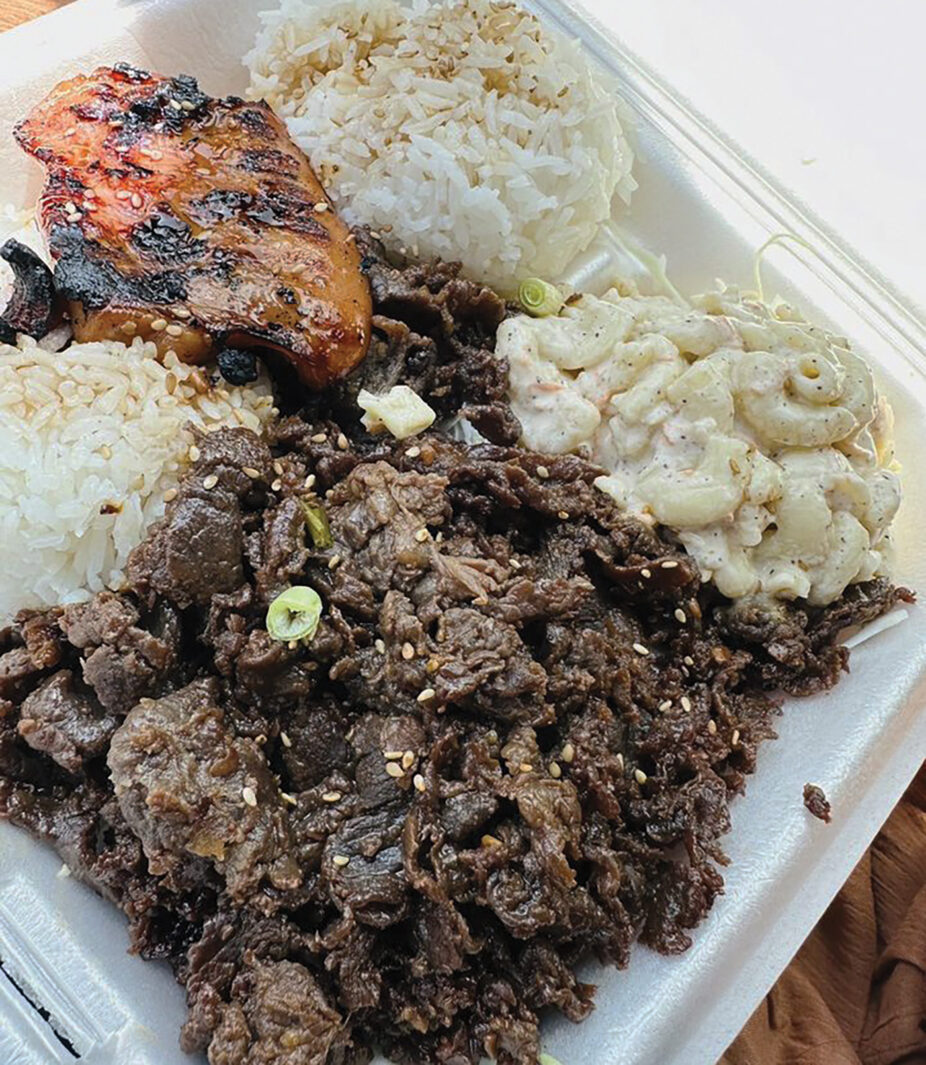 A beef and chicken plate from Aloha Made BBQ served in a styrofoam to-go container