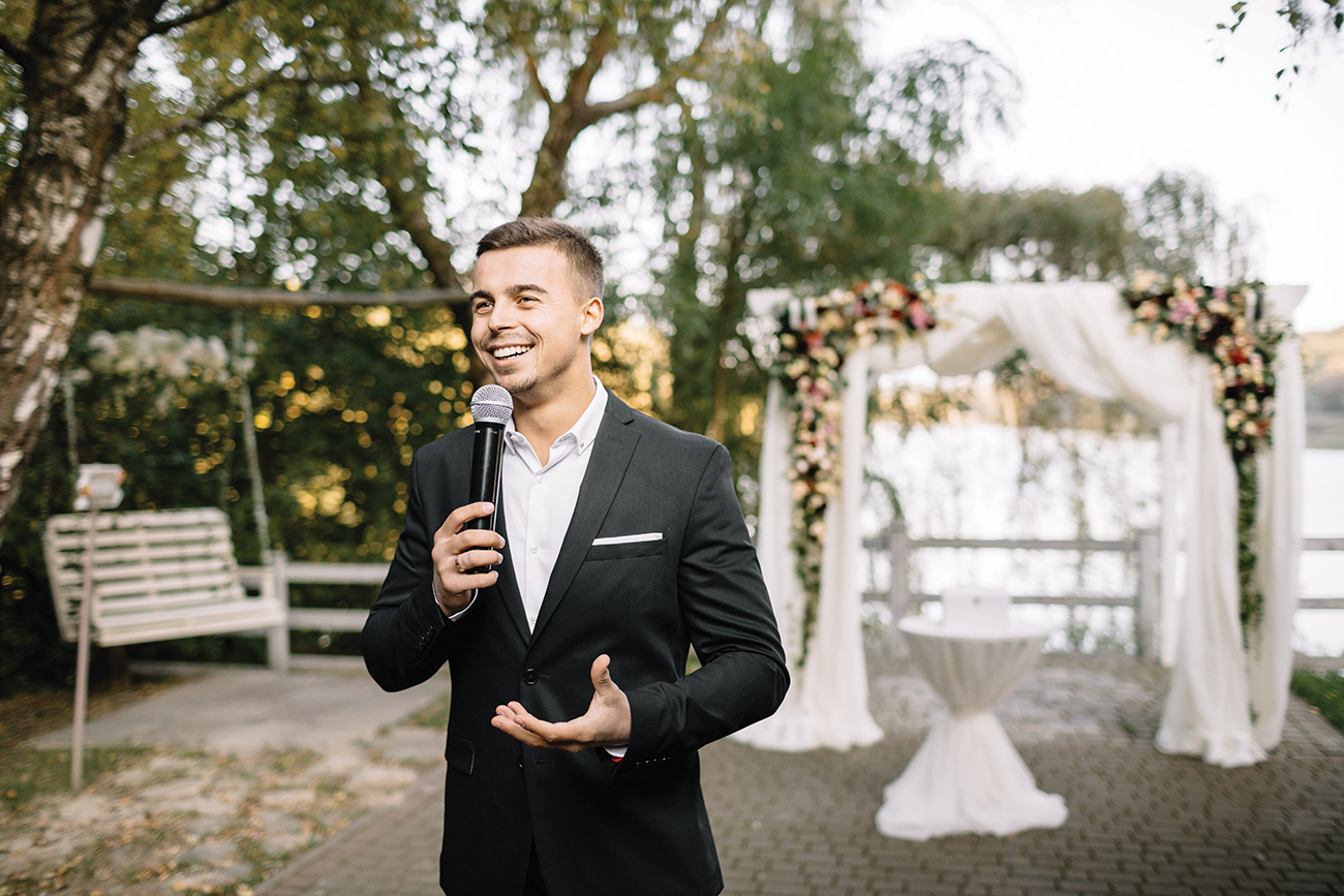 Man giving a toast at a wedding